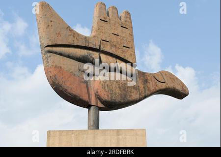 INDIA, Chandigarh, the master plan of the city divided in sectors was prepared by swiss-french architect Le Corbusier in the 1950` , Sector 1 Capitol complex, metal and concrete monument The Open Hand designed by Le Corbusier, symbolizes 'the hand to give and the hand to take; peace and prosperity, and the unity of mankind' Stock Photo